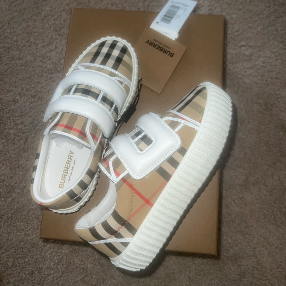 Brand new kids Burberry shoes never worn still have tags just want what I paid